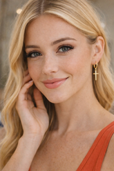Dangle cross gold earrings